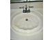 Close up of a white sink with a stainless steel faucet at 2520 Legend Mill Run, Dacula, GA 30019