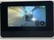 Home security system with a monitor showing outdoor surveillance at 2520 Legend Mill Run, Dacula, GA 30019