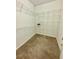 Walk-in closet with carpeted flooring and metal shelving at 2520 Legend Mill Run, Dacula, GA 30019