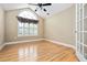 Bright bedroom featuring hardwood floors, large windows with custom blinds and a vaulted ceiling at 311 Ridge Hill Cir # 1, Marietta, GA 30064