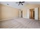 Spacious bedroom featuring neutral carpeting and multiple closets and doors at 311 Ridge Hill Cir # 1, Marietta, GA 30064