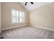 Bedroom with neutral carpet, bright window, and vaulted ceiling at 311 Ridge Hill Cir # 1, Marietta, GA 30064
