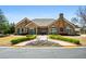 A stone community building with manicured landscaping at 311 Ridge Hill Cir # 1, Marietta, GA 30064
