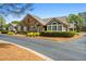 Charming stone and siding home with well-manicured landscaping and a neatly paved driveway at 311 Ridge Hill Cir # 1, Marietta, GA 30064