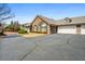 Beautiful home with a stone facade, attached garage, and well-kept landscaping and paved driveway at 311 Ridge Hill Cir # 1, Marietta, GA 30064