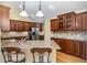 Kitchen featuring granite countertops, stainless steel appliances, hardwood floors, and cherry wood cabinetry at 311 Ridge Hill Cir # 1, Marietta, GA 30064
