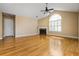 Bright, open living room with hardwood floors, vaulted ceiling, fireplace and arched window at 311 Ridge Hill Cir # 1, Marietta, GA 30064