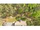An aerial view of the house surrounded by lush greenery, showcasing the property's tranquil setting at 3800 Macland Rd, Hiram, GA 30141