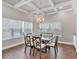Bright dining room with coffered ceilings, a chandelier, and views of the landscaped yard at 3800 Macland Rd, Hiram, GA 30141