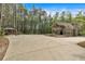 Expansive driveway and charming two story home with inviting outdoor gazebo for entertaining guests at 3800 Macland Rd, Hiram, GA 30141