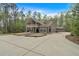 Stunning two-story home with a spacious driveway and inviting front porch and a full garage at 3800 Macland Rd, Hiram, GA 30141