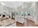 Beautiful kitchen with center island, stainless appliances, and a view to the outdoor deck at 3800 Macland Rd, Hiram, GA 30141
