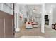 Open-concept living room with high ceilings, fireplace, and staircase to the upper level at 3800 Macland Rd, Hiram, GA 30141