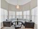 Bright sitting area with large windows, decorative lighting, and comfortable circular seating at 3800 Macland Rd, Hiram, GA 30141