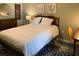 Cozy bedroom featuring a comfortable bed, soft lighting, and stylish decor at 620 Glen Iris Ne Dr # 401, Atlanta, GA 30308