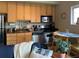 A well-appointed kitchen with stainless steel appliances and granite countertops, adjacent to a cozy dining area at 620 Glen Iris Ne Dr # 401, Atlanta, GA 30308