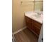 Bathroom featuring a wood vanity with a white countertop and a white sink at 6715 Roscommon Dr, Austell, GA 30168