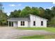 Charming single-story home with a carport and a well-maintained front yard at 1070 Kirkland Rd, Covington, GA 30016