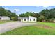 Well-kept single story home with a carport and driveway at 1070 Kirkland Rd, Covington, GA 30016