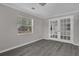 Bright bedroom with view of backyard via french doors at 1509 Stone Gate Ln, Atlanta, GA 30317