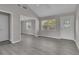 Open living area with hardwood-style floors, crisp molding, and lots of light at 1509 Stone Gate Ln, Atlanta, GA 30317