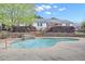 Outdoor swimming pool surrounded by lush hedges and stone accents for ultimate relaxation at 1509 Stone Gate Ln, Atlanta, GA 30317