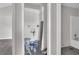 Small utility room with a view of an adjacent bathroom at 1509 Stone Gate Ln, Atlanta, GA 30317