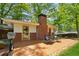 Outdoor patio with seating area, ideal for relaxation and enjoying the backyard at 3700 Sexton Woods Dr, Chamblee, GA 30341