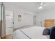 Cozy bedroom featuring a plush bed, double closet, and ensuite bathroom at 3700 Sexton Woods Dr, Chamblee, GA 30341