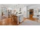 Modern kitchen with an island, stainless steel appliances, and hardwood floors throughout at 3700 Sexton Woods Dr, Chamblee, GA 30341