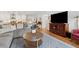 Open concept living room featuring hardwood floors that flows to the updated kitchen at 3700 Sexton Woods Dr, Chamblee, GA 30341