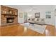 Inviting living room featuring a brick fireplace and neutral décor, enhancing comfort and style at 3700 Sexton Woods Dr, Chamblee, GA 30341