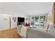 Cozy living room with hardwood floors and a large window with lots of natural light at 3700 Sexton Woods Dr, Chamblee, GA 30341
