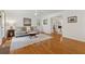 Comfortable living room showcasing hardwood floors, neutral tones, and easy access to the laundry area at 3700 Sexton Woods Dr, Chamblee, GA 30341
