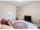 Bedroom featuring a television and large closet at 3983 Fireoak Dr, Decatur, GA 30032