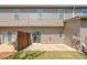 Townhome back exterior with sliding door access to patio and a wood fence for privacy at 3983 Fireoak Dr, Decatur, GA 30032