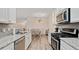 Well-equipped kitchen offers updated appliances and seamless flow into the dining area at 3983 Fireoak Dr, Decatur, GA 30032