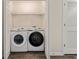 A conveniently located laundry room with a washer and dryer at 3983 Fireoak Dr, Decatur, GA 30032