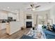 Bright living room with fireplace flows into kitchen, offering great natural light at 3983 Fireoak Dr, Decatur, GA 30032