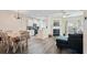 Open-concept living space with fireplace seamlessly connects kitchen and dining area at 3983 Fireoak Dr, Decatur, GA 30032