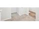 Bedroom with plush carpeting, showing entrance to a bathroom with laminate flooring at 4437 Ben Hill Rd, Atlanta, GA 30349