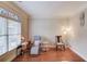 Bright living room featuring hardwood floors and plenty of natural light at 1633 Park Hollow Ln, Lawrenceville, GA 30043