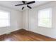 Bright bedroom featuring hardwood floors, and two windows at 22 Vinson Se Dr, Atlanta, GA 30317