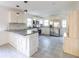 Spacious kitchen with granite countertops, stainless steel appliances, and white cabinetry at 22 Vinson Se Dr, Atlanta, GA 30317