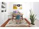 Bright home office with built-in shelves, a modern desk, and natural light at 22 Vinson Se Dr, Atlanta, GA 30317