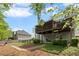 Spacious backyard featuring a upper deck and a covered patio at 3450 N Cook Rd, Powder Springs, GA 30127