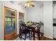Cozy breakfast nook beside the kitchen, with views to a screened porch and an adjacent deck at 3450 N Cook Rd, Powder Springs, GA 30127