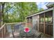 Relaxing outdoor deck area with an outdoor grill and seating at 3450 N Cook Rd, Powder Springs, GA 30127