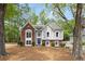 Charming two-story home features a well-manicured front yard and beautiful brick and siding accents at 3450 N Cook Rd, Powder Springs, GA 30127