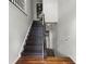 Inviting entryway with hardwood floors and a staircase leading to the upper level at 3450 N Cook Rd, Powder Springs, GA 30127